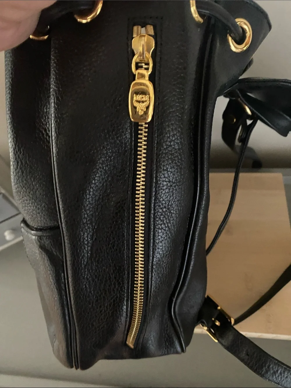 MCM Black Pebbled Leather Backpack with Gold Emblem Hardwarer